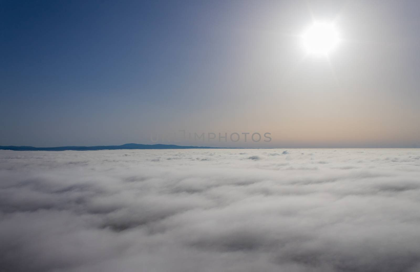 Hot air balloon in the Alentejo region, above the clouds. Portugal.