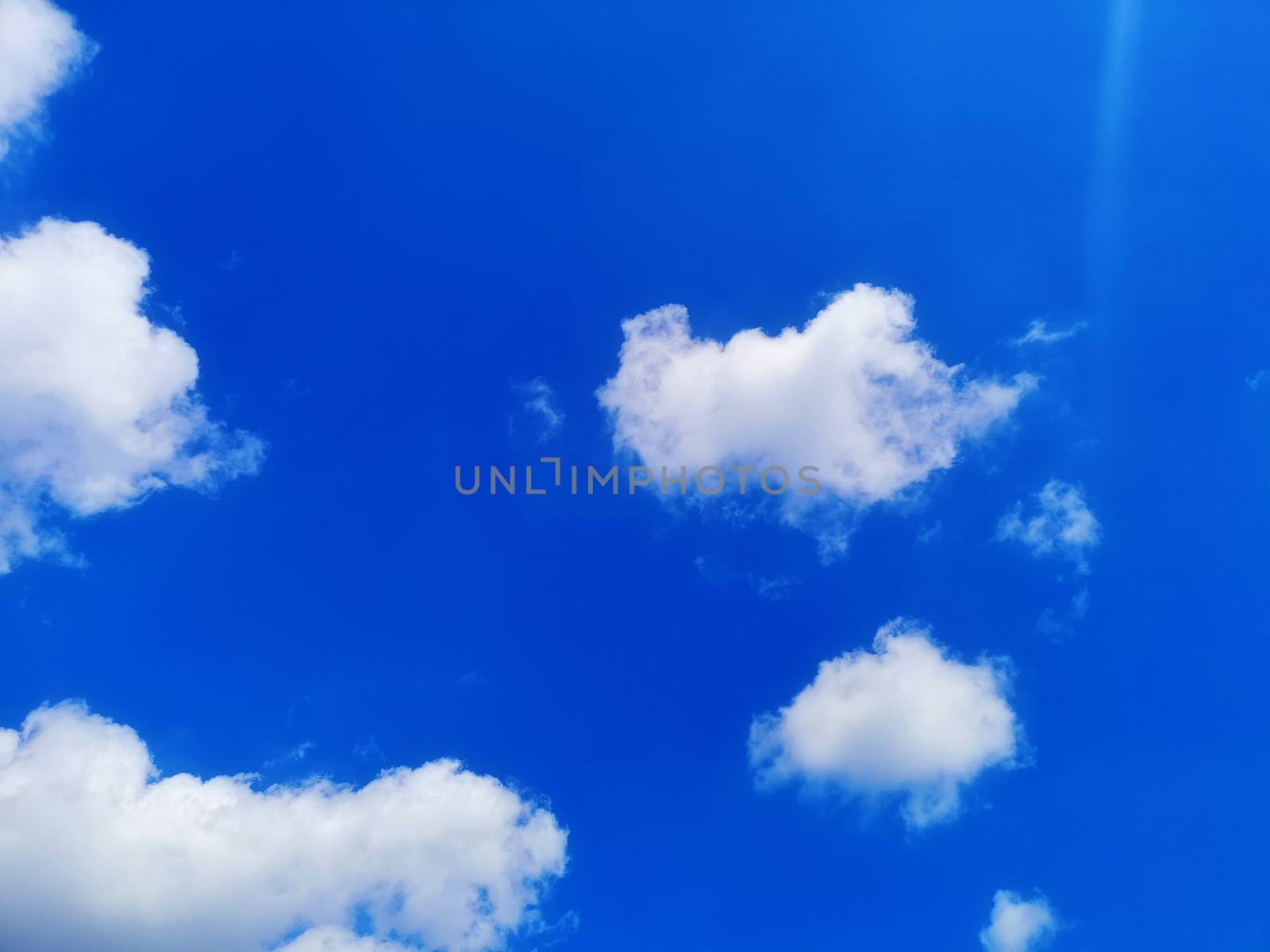 Beautiful blue sky and clouds natural background by galinasharapova