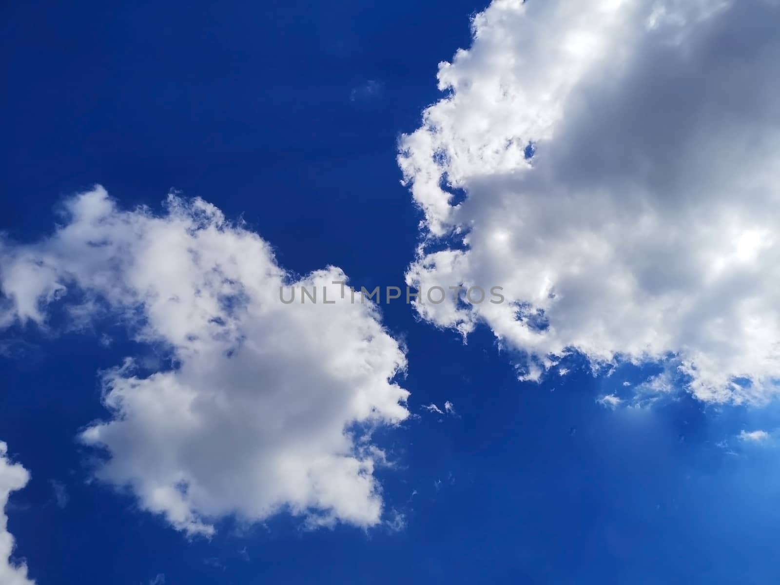 Beautiful blue sky and clouds natural background by galinasharapova