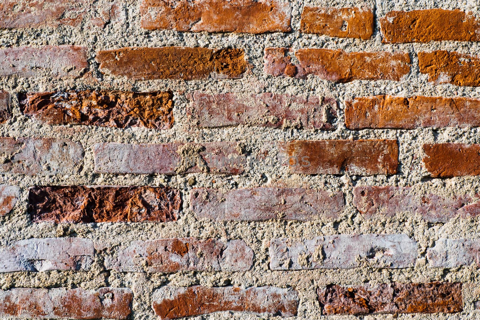 Abstract Brick Wall Surface. Marble Textured Background of Old Brick Wall.