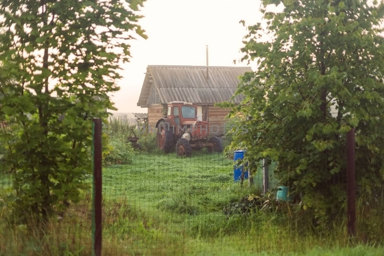 Rural landscape on a early foggy morning in the village. by galinasharapova