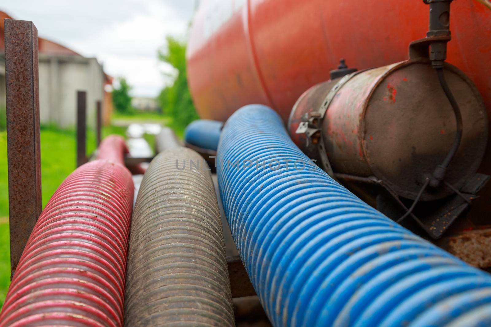 Pipe of a Sewage Pumping Machine. Providing Sewer Cleaning Service Outdoor.