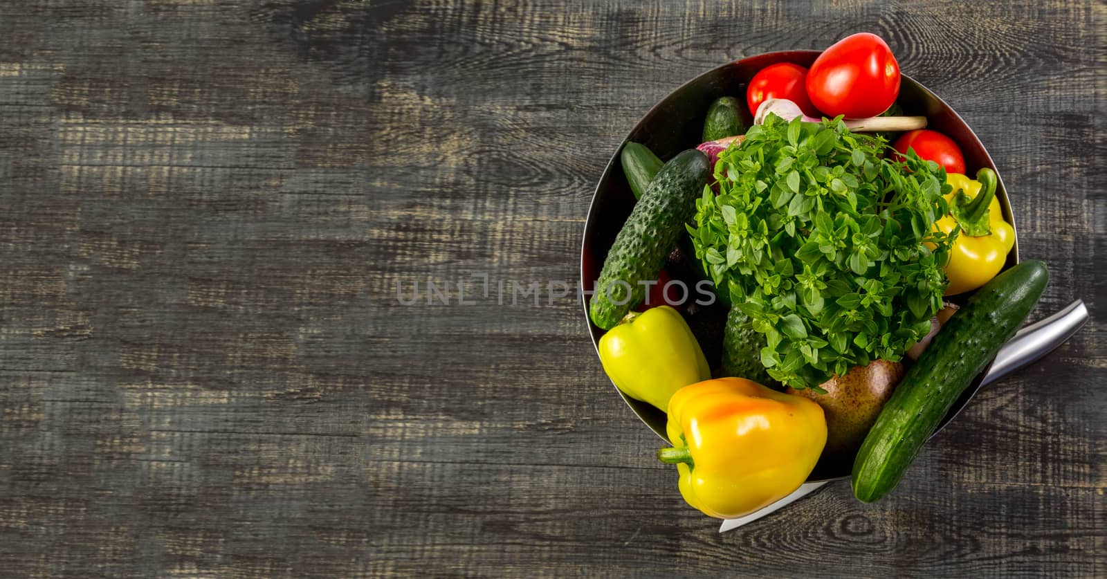 Pepper, garlic, tomato, cucumber, basil on a cutting board by galinasharapova