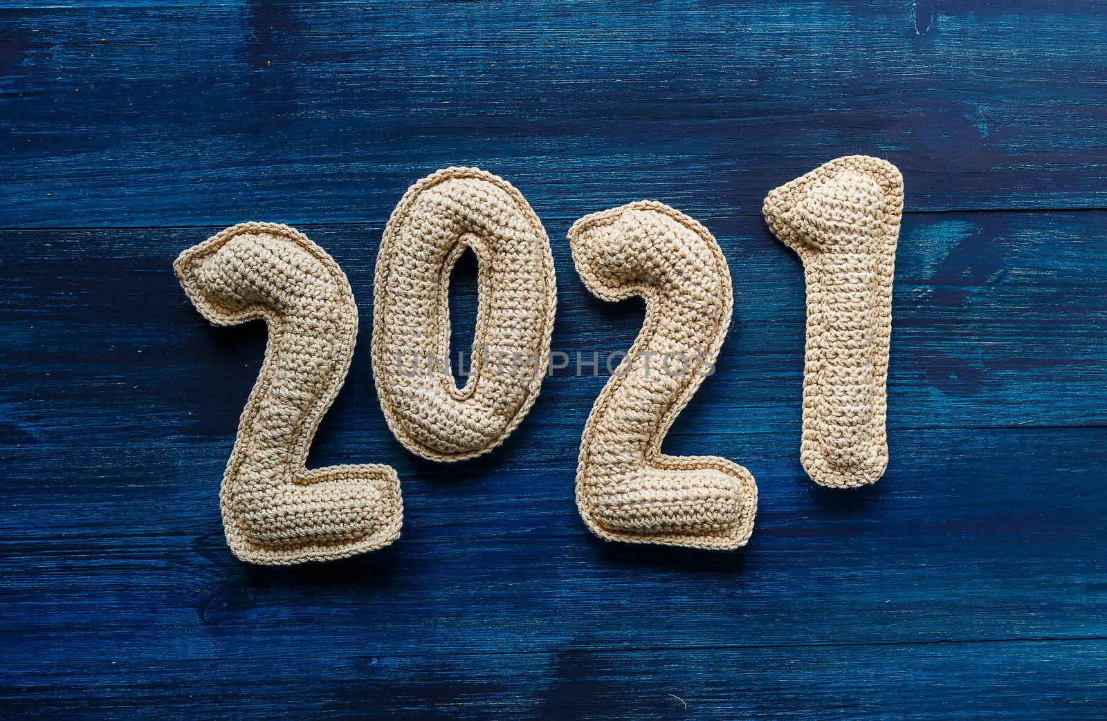 Numerals 2021 made of crochet handmade numbers. New year concept. Vision of new twenty twenty one logo Plastic numbers 2021 but white background. New Year 2021. Results of 2021. Concept