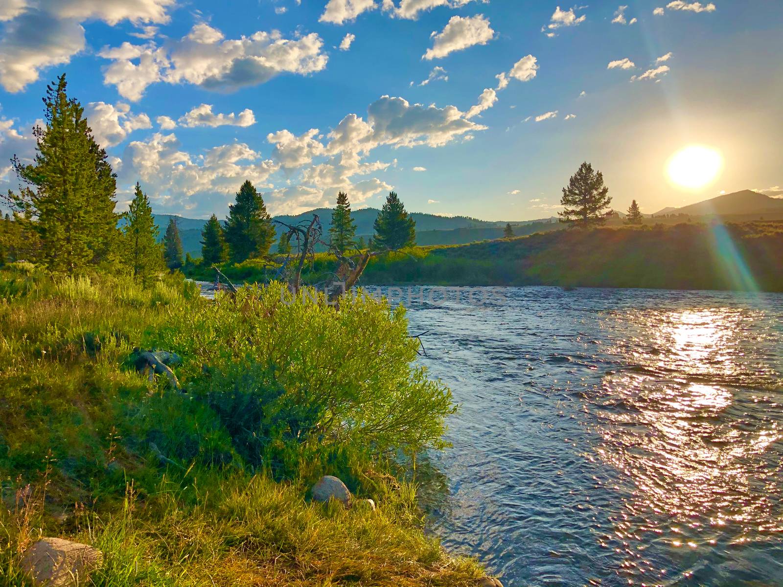 Sunset on the Salmon River near Stanley Idaho. by patrickstock
