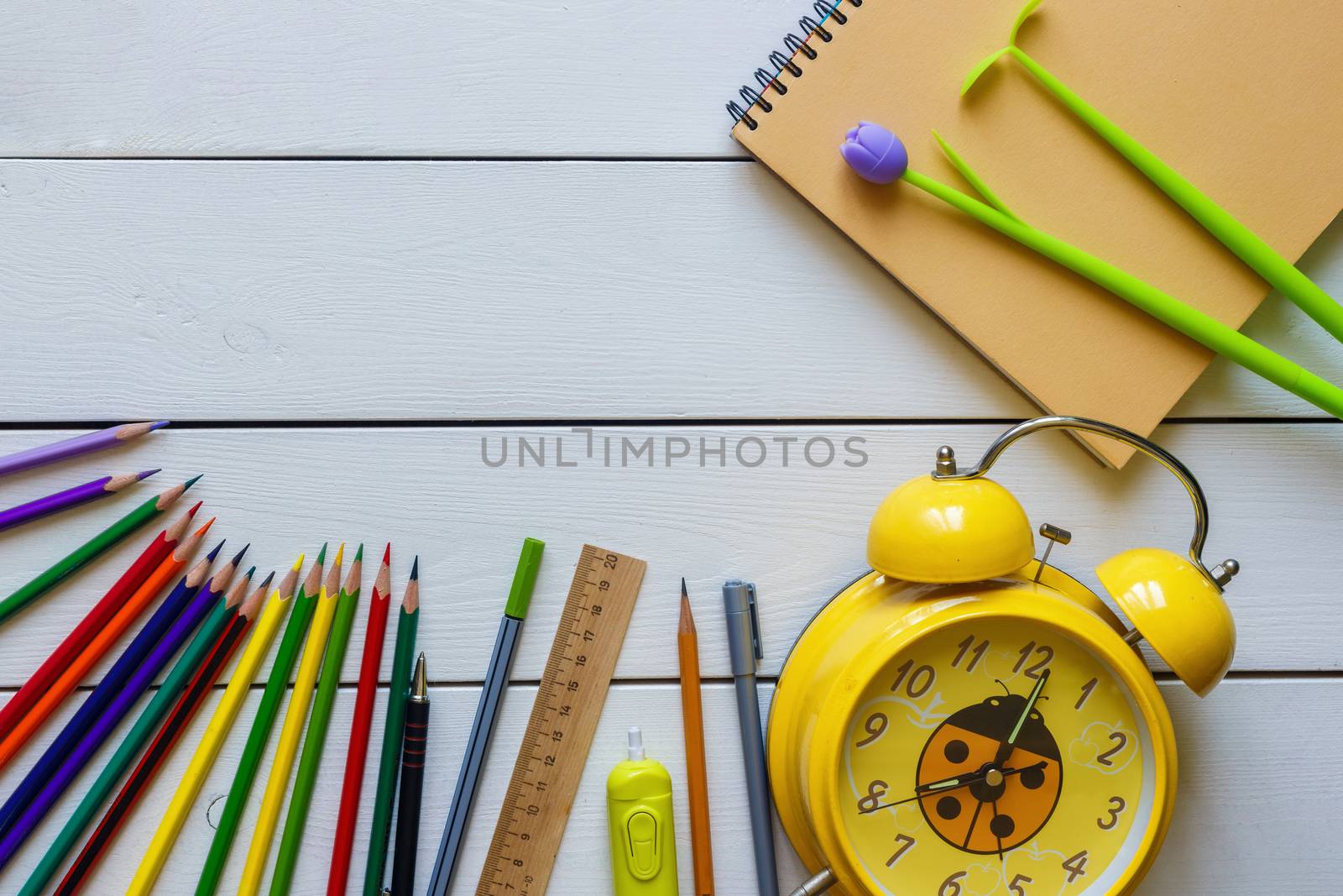 Back to school concept school office supplies on a white wooden background by galinasharapova