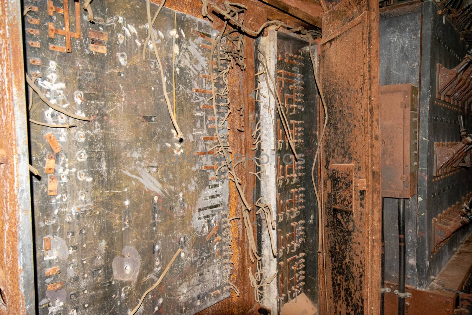 An Old Control Board on a Stage in an Abandoned Theatre by bju12290