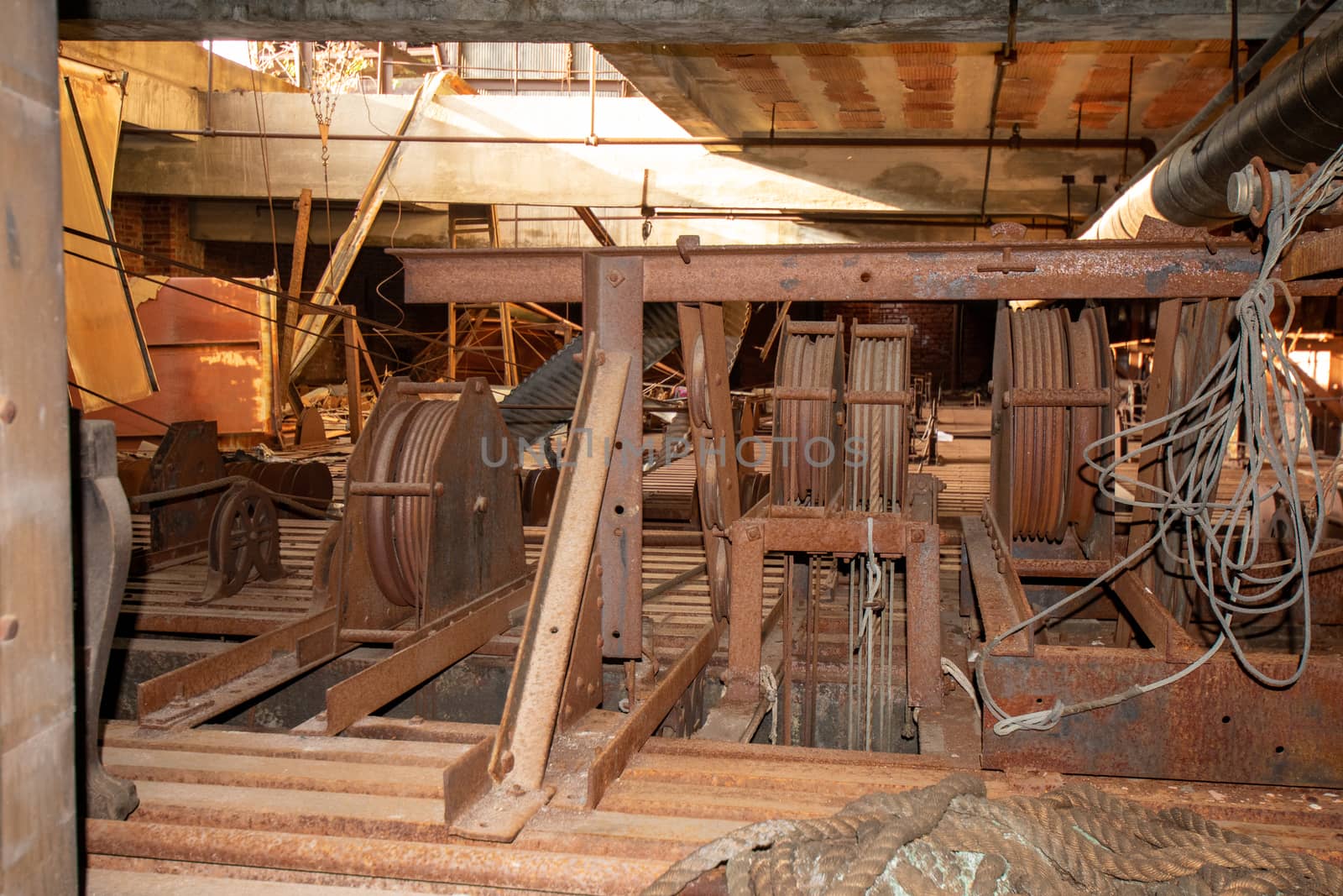 The Rusty Mechanisms of an Abandoned Theatre Above the Stage by bju12290