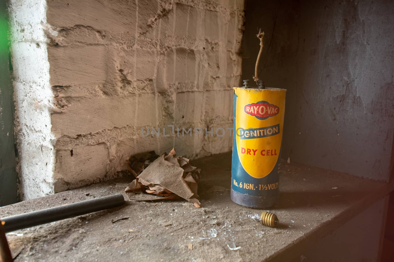 NEWARK, NEW JERSEY - JULY 17, 2020: An Antique Ray-O-Vac Dry Cell Ignition Battery Sits Forgotten Inside the Abandoned Proctors Palace Theatre in Newark, New Jersey.