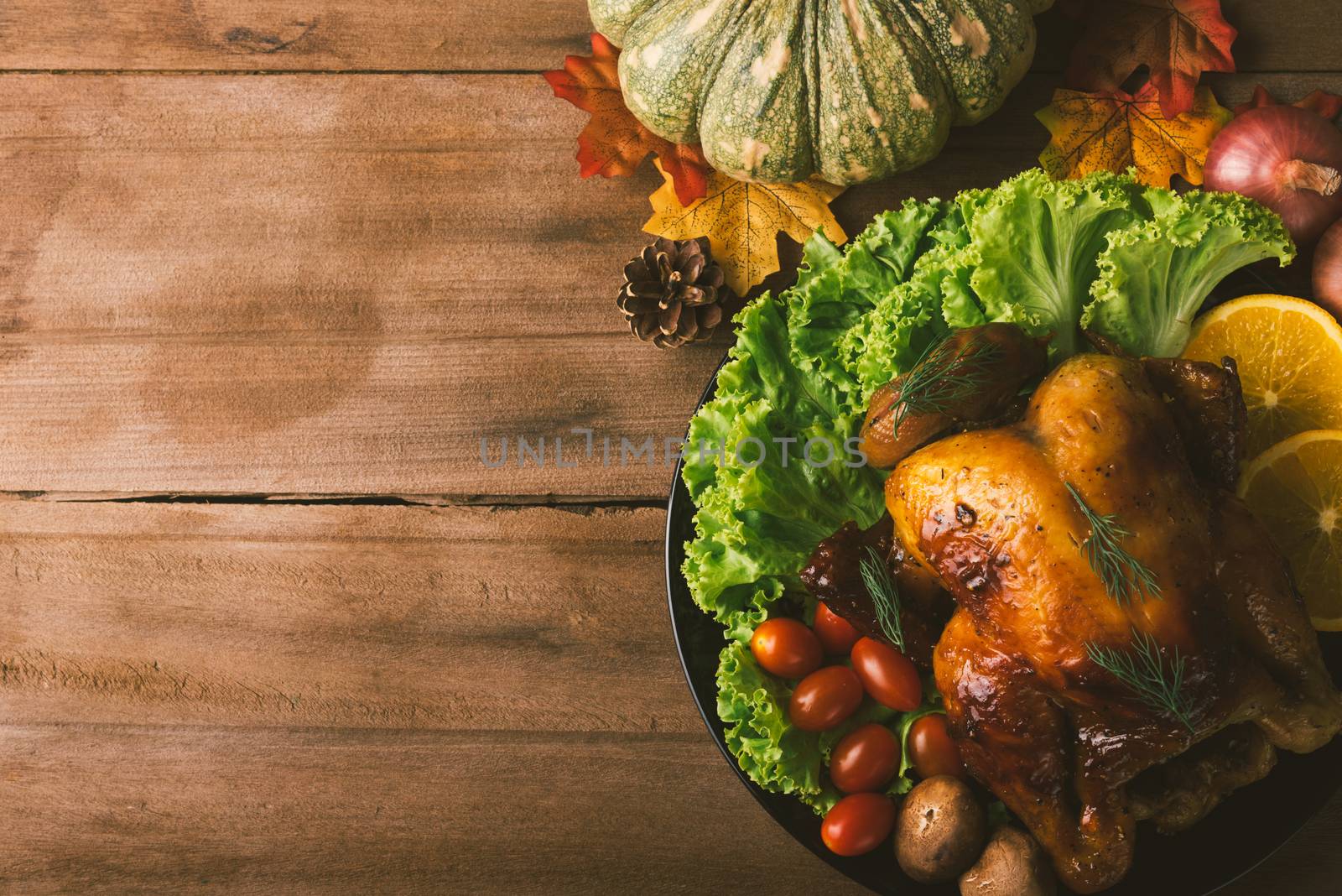 Thanksgiving baked turkey or chicken and vegetables, Christmas dinner feast food decoration, studio shot on wooden table background, Happy thanksgiving day of holiday concept