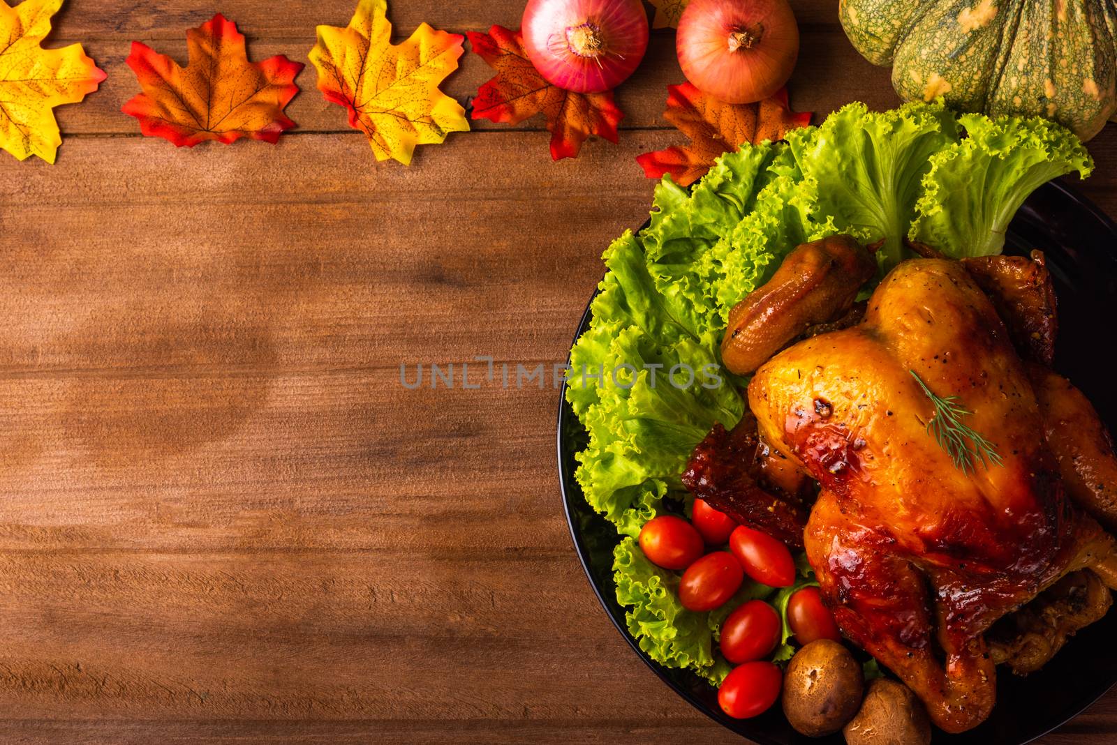 Thanksgiving baked turkey or chicken and vegetables, Christmas dinner feast food decoration, studio shot on wooden table background, Happy thanksgiving day of holiday concept