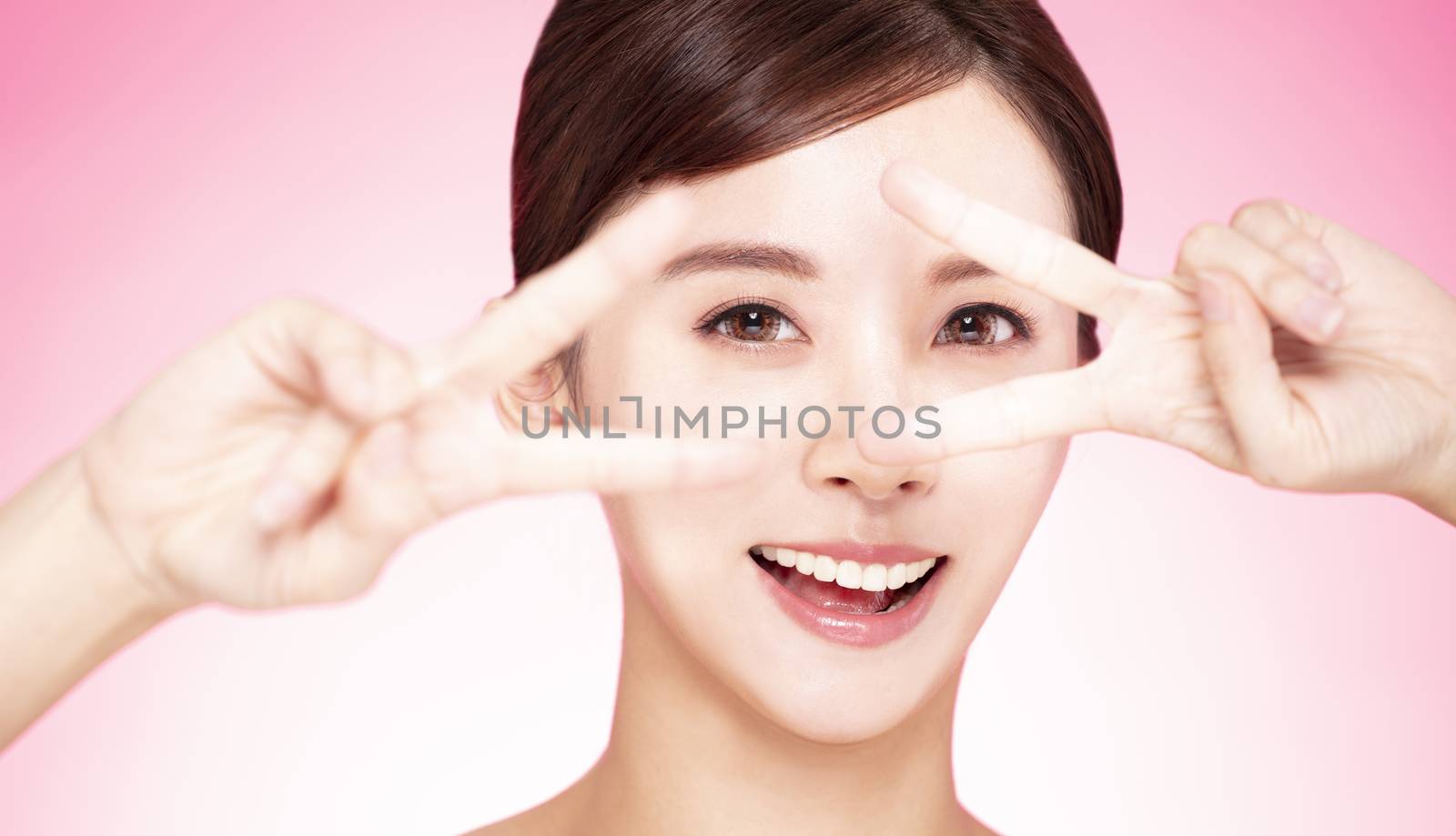 closeup cute lovely girl face and hand with looking gesture by tomwang