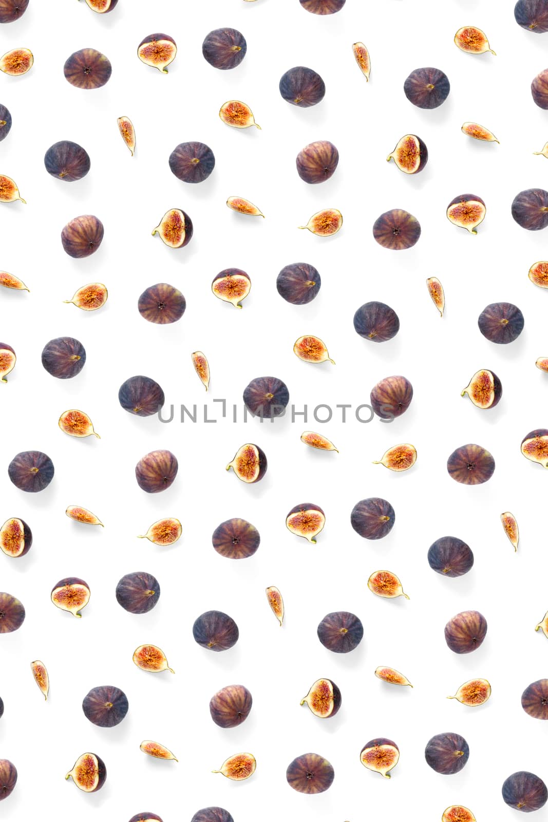 Background from Fresh figs. Food Photo. Creative set of the whole and sliced figs on a white background, Modern fig fruits background. by PhotoTime