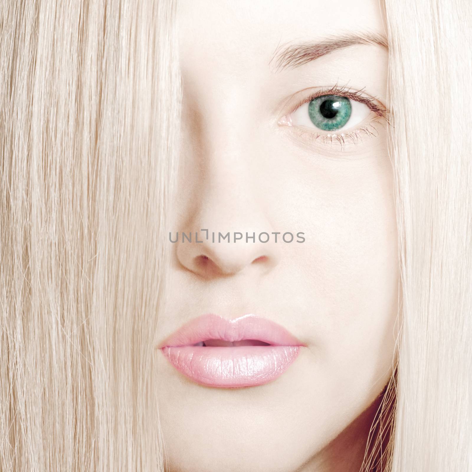 Beauty face close-up of young woman, blonde hair and chic make-up for skincare and haircare brand by Anneleven