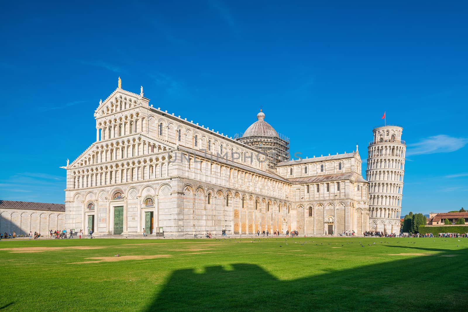 Pisa Cathedral and the Leaning Tower in a sunny day in Pisa, Italy.