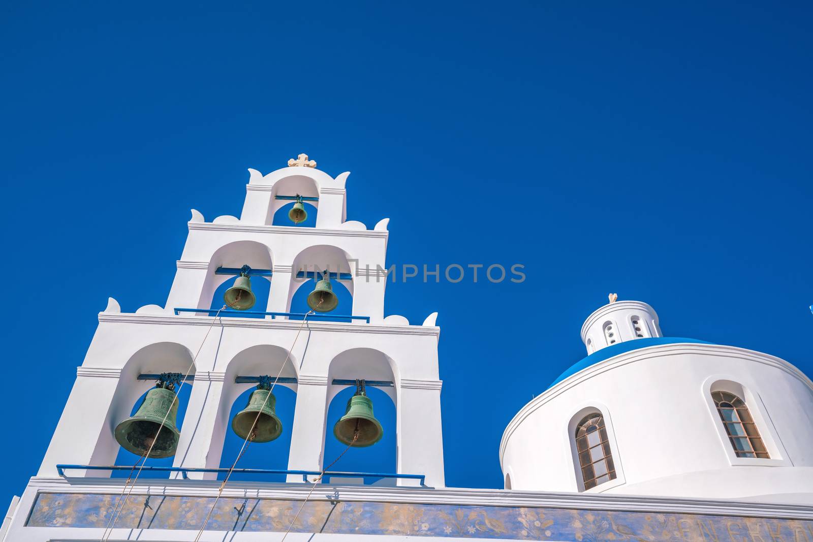 Oia town cityscape at Santorini island in Greece. Aegean sea