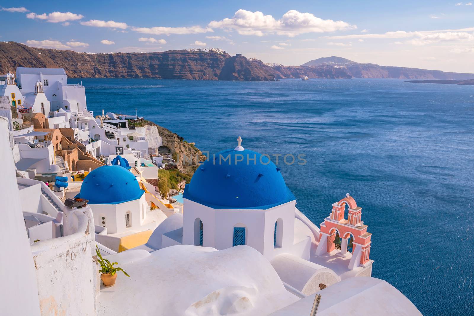 Oia town cityscape at Santorini island in Greece. Aegean sea