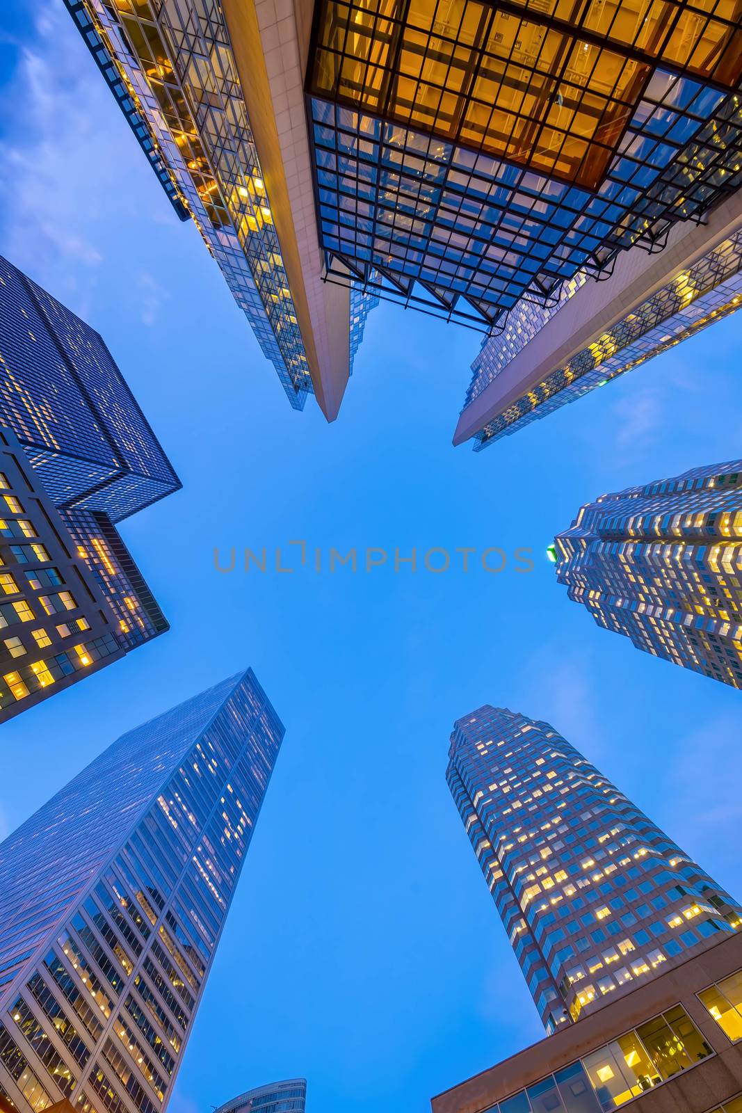 Looking up shot of downtown financial district with skyscrapers  by f11photo