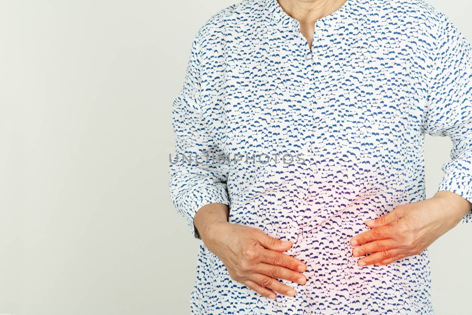 Senior woman painful stomachache at home,Female suffering from abdominal pain