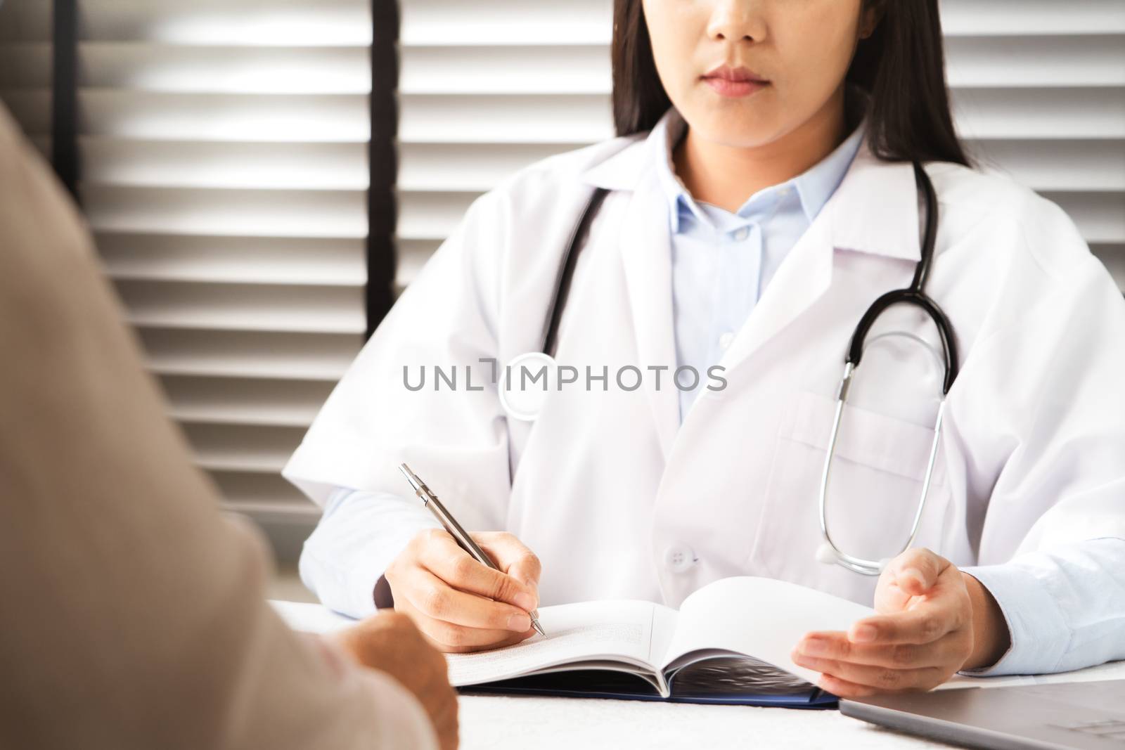 Doctor talking to patient hands closeup. Diagnostic, prevention of women diseases, healthcare, medical service and consultation