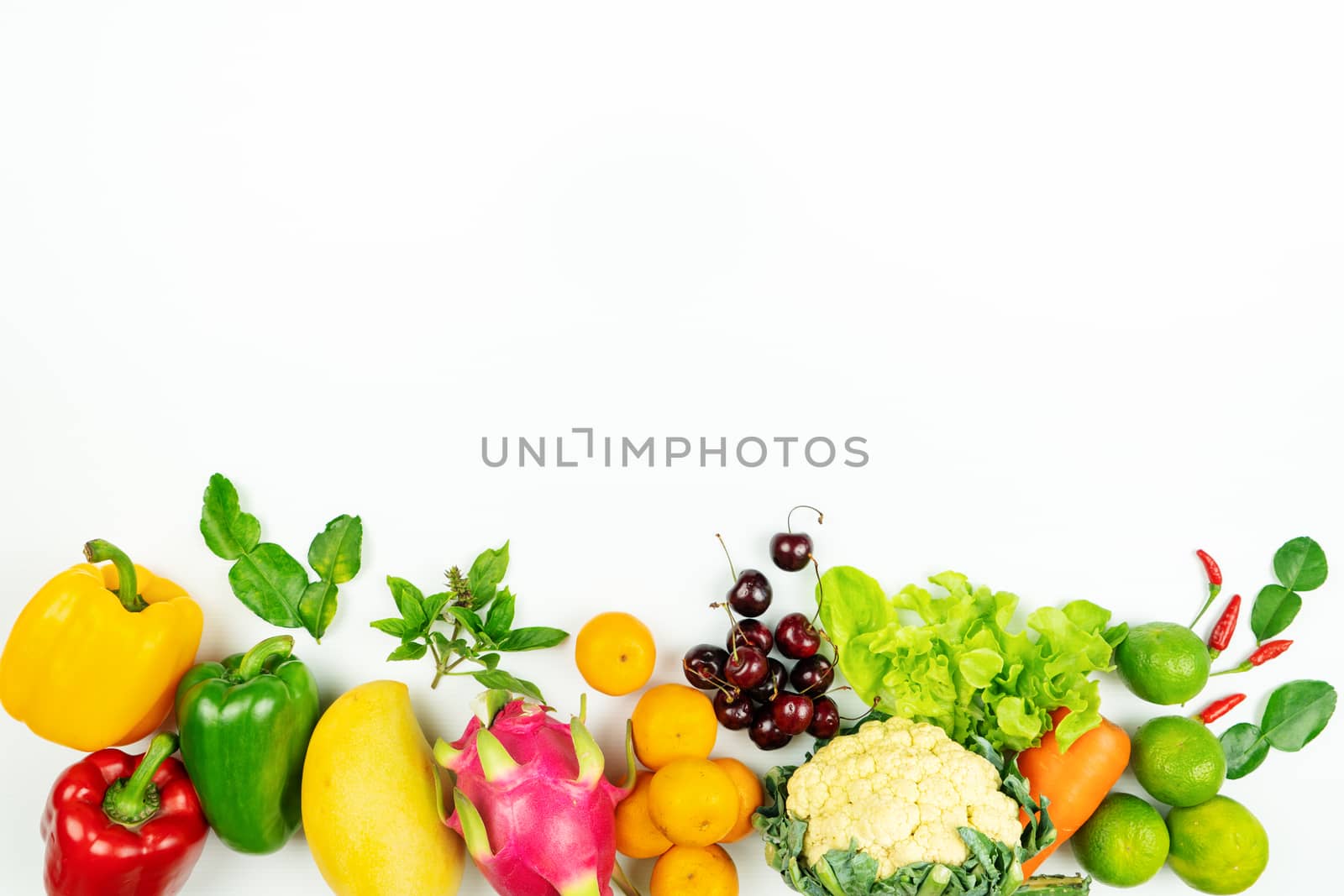 Fresh fruit and vegetable. Flat lay of fresh raw organic vegetables on white background