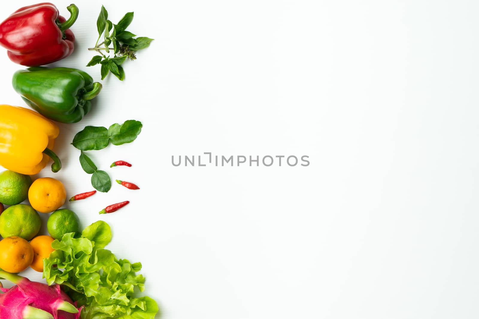 Fresh fruit and vegetable. Flat lay of fresh raw organic vegetables on white background