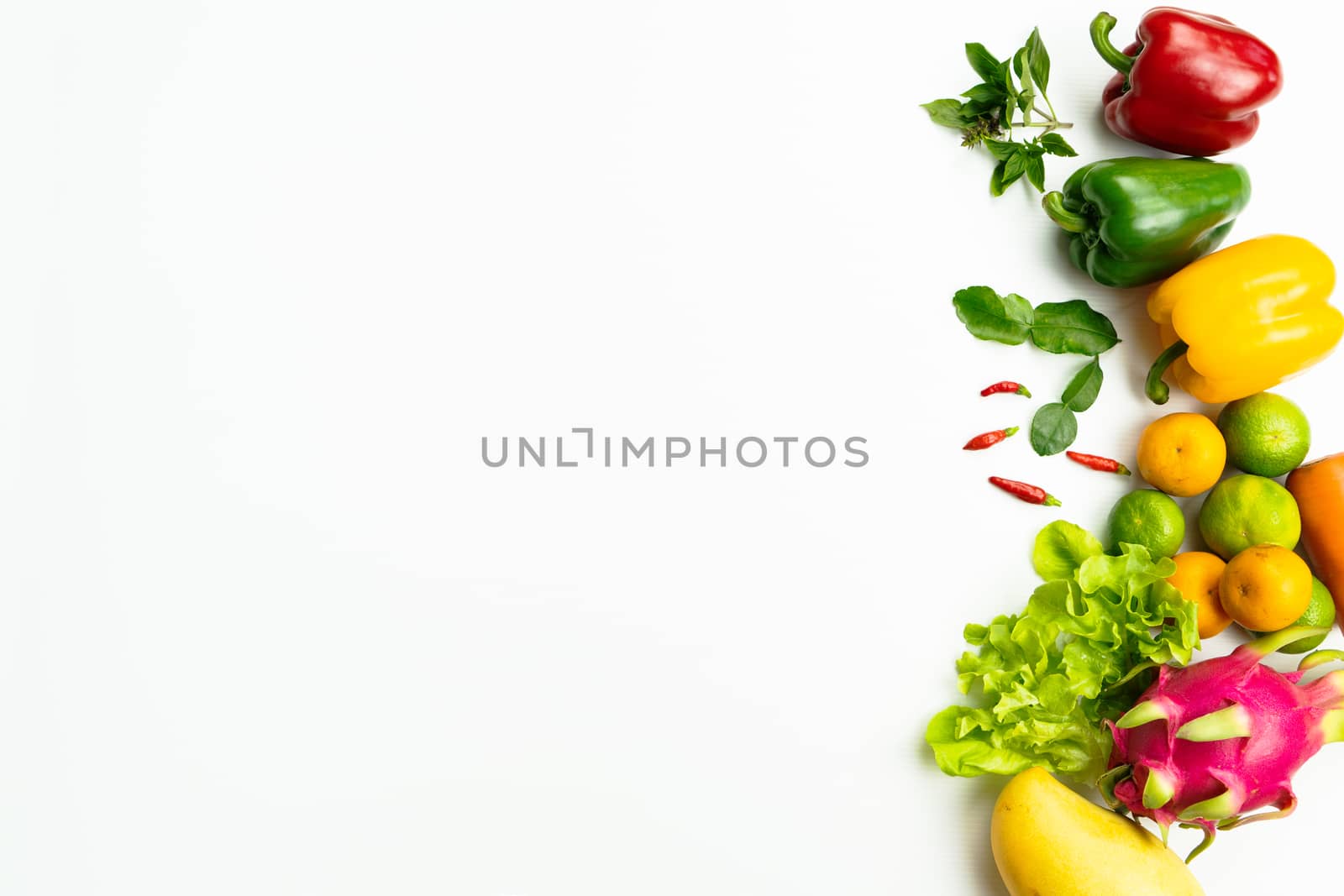 Fresh fruit and vegetable. Flat lay of fresh raw organic vegetables on white background