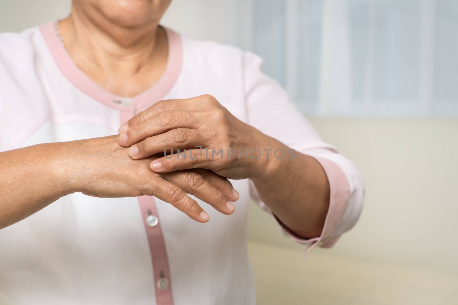 senior women scratch hand the itch on eczema arm, healthcare and medicine concept