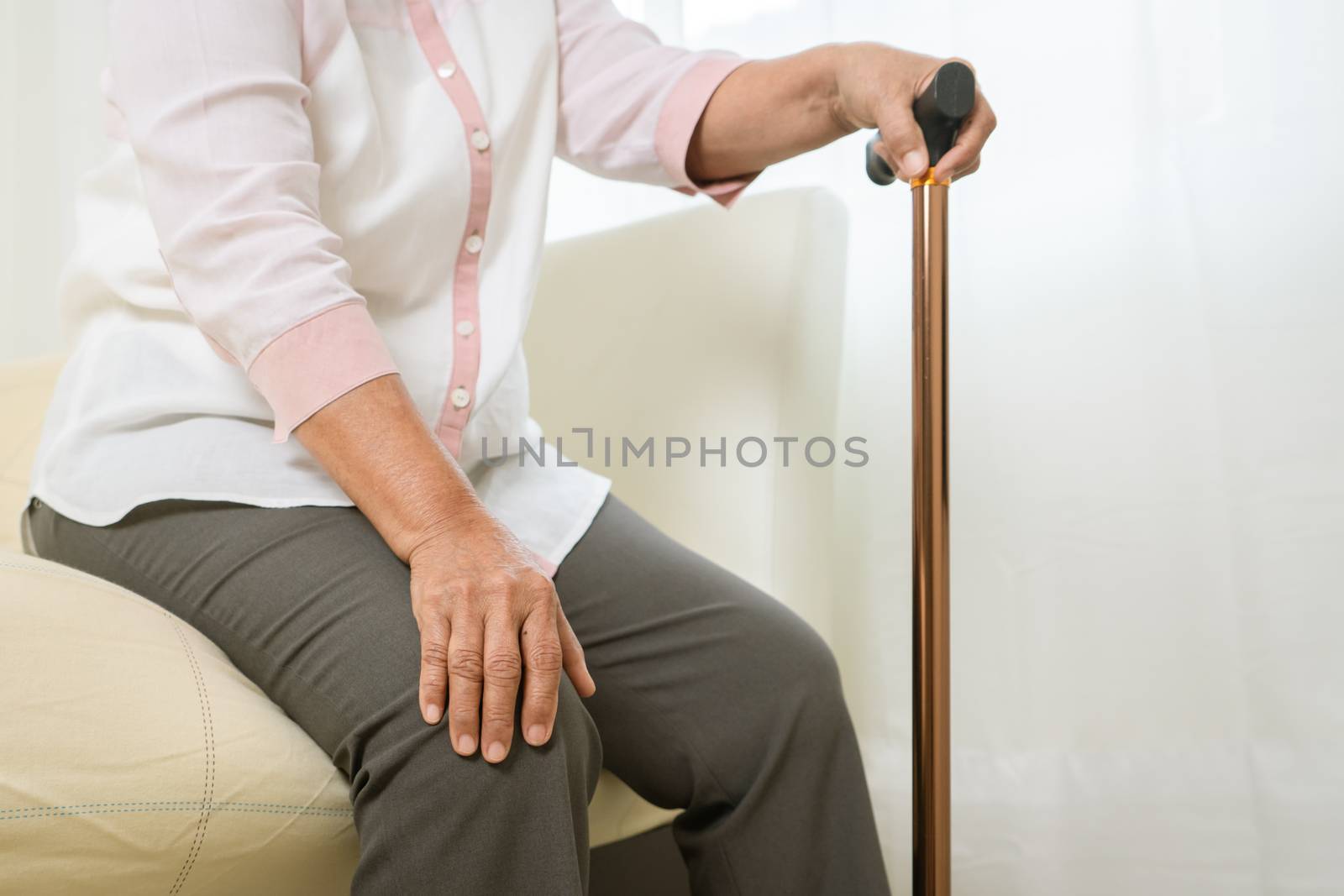 Knee pain of senior woman with stick, healthcare problem of senior concept