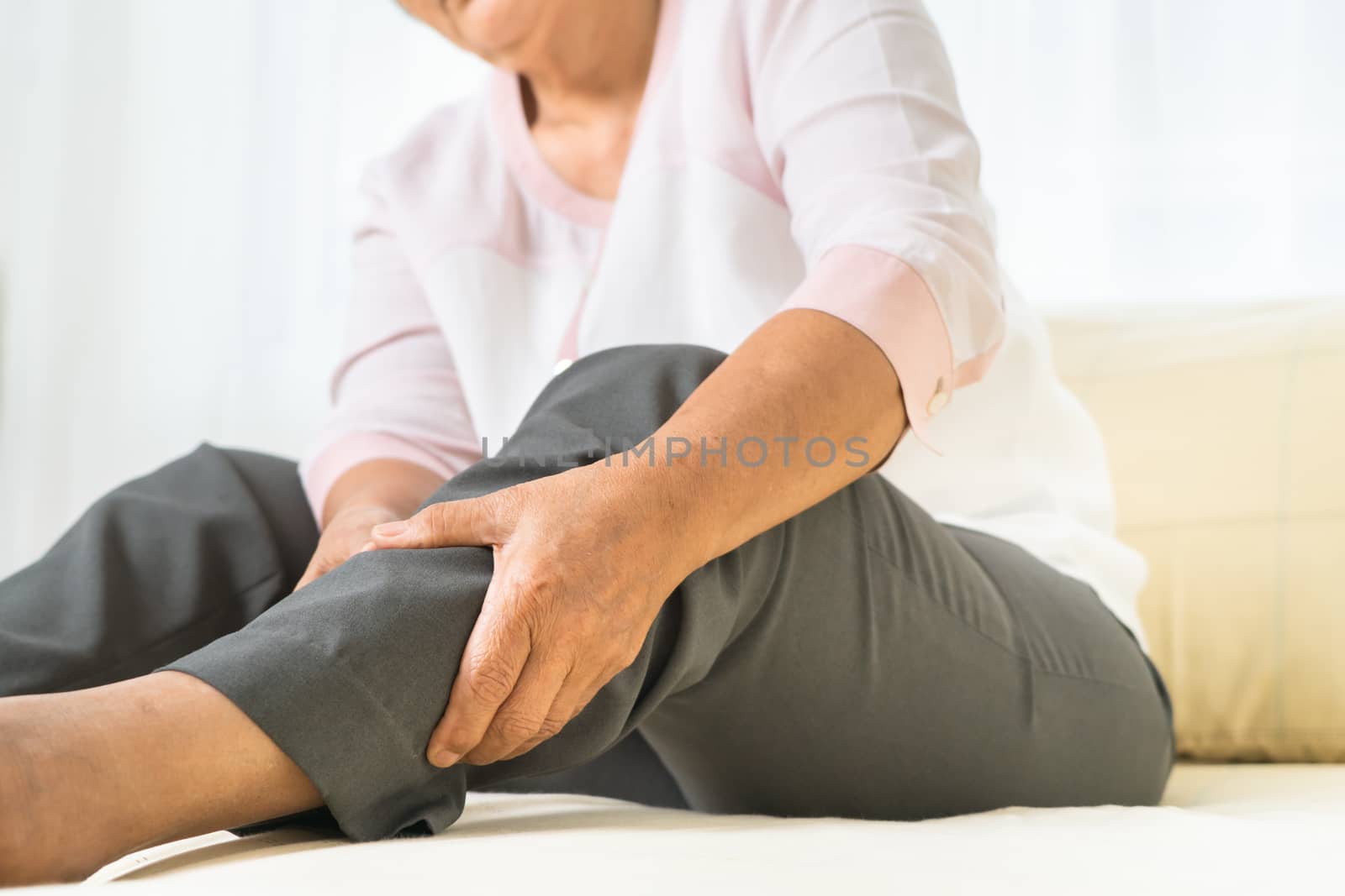 leg pain of senior woman at home, healthcare problem of senior c by psodaz