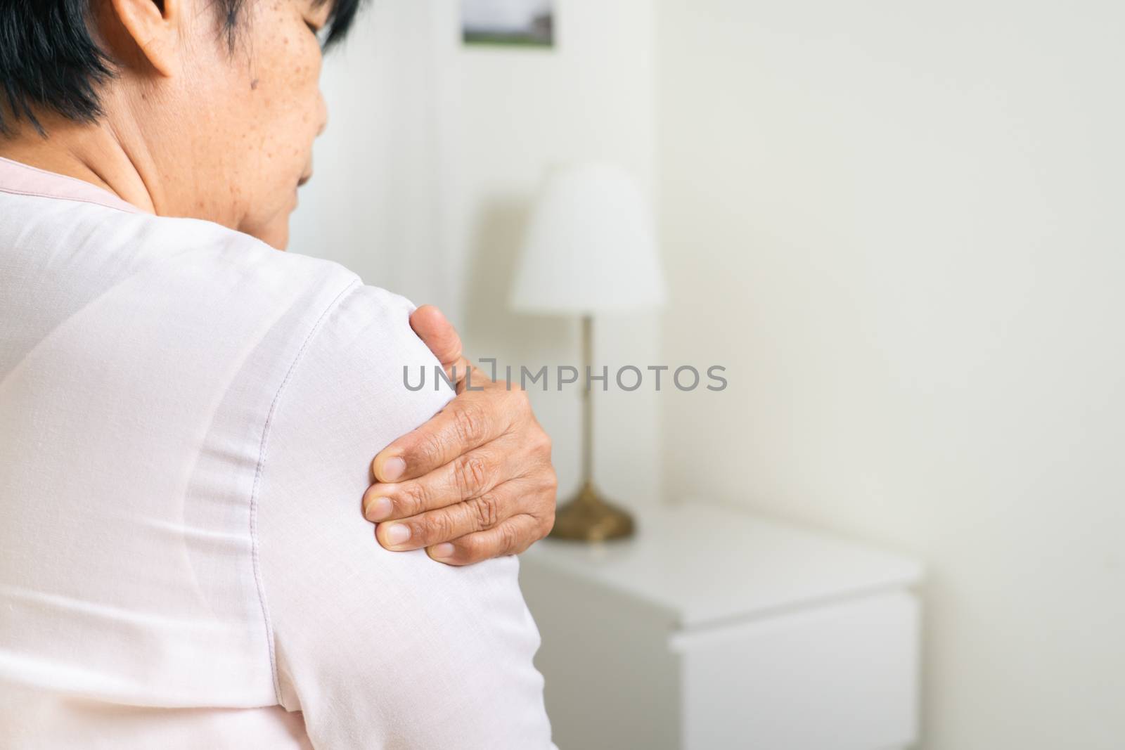 shoulder pain old woman suffering from neck and shoulder injury, healthcare problem of senior concept