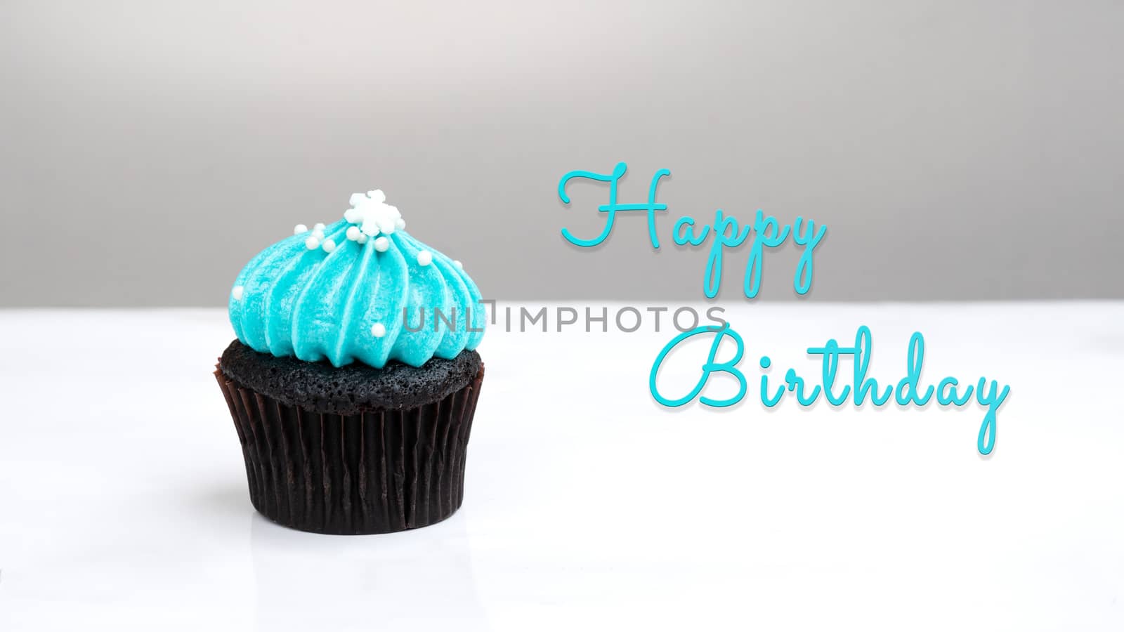 Happy Birthday cute cupcake on white background