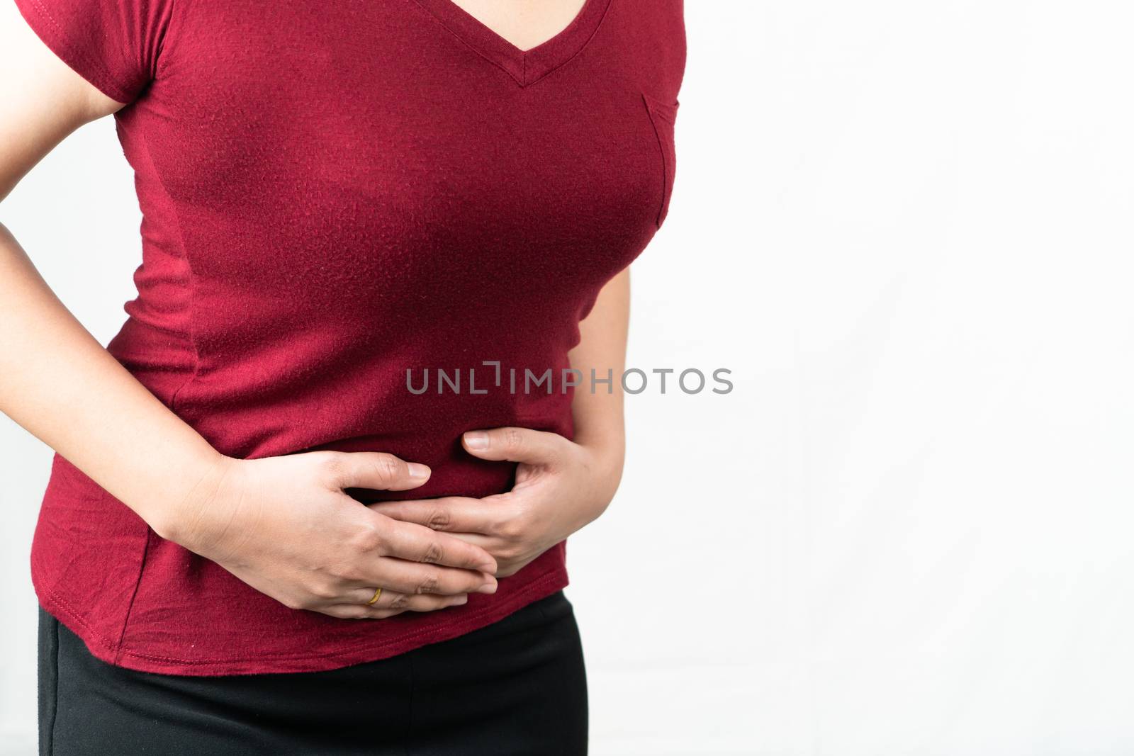 stomachache, young woman suffering from abdominal pain feeling symptom of pms on white background