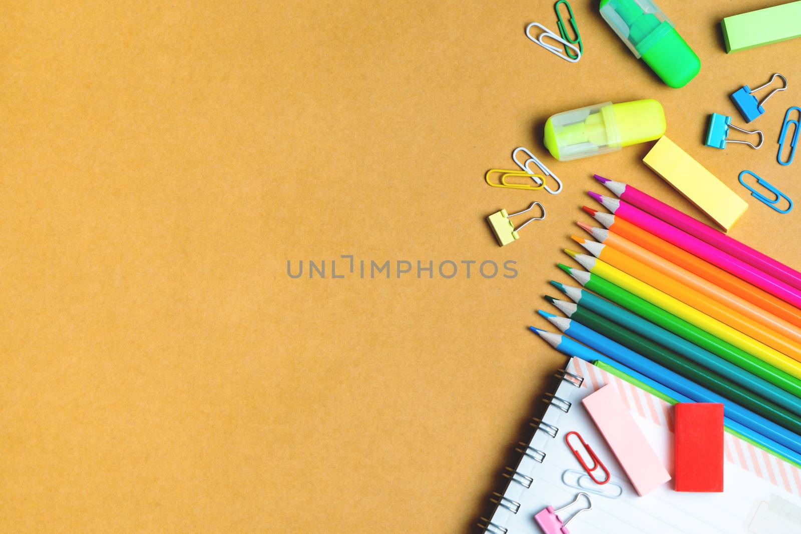 School supplies on black board background. Back to school concept