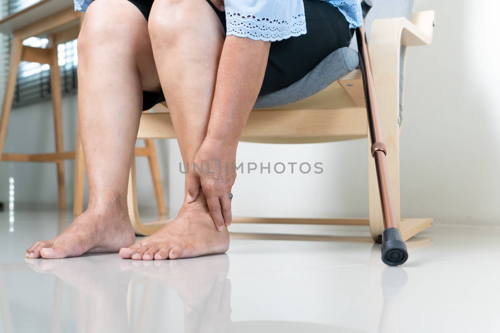 Ankle leg pain of senior woman at home, healthcare problem of se by psodaz