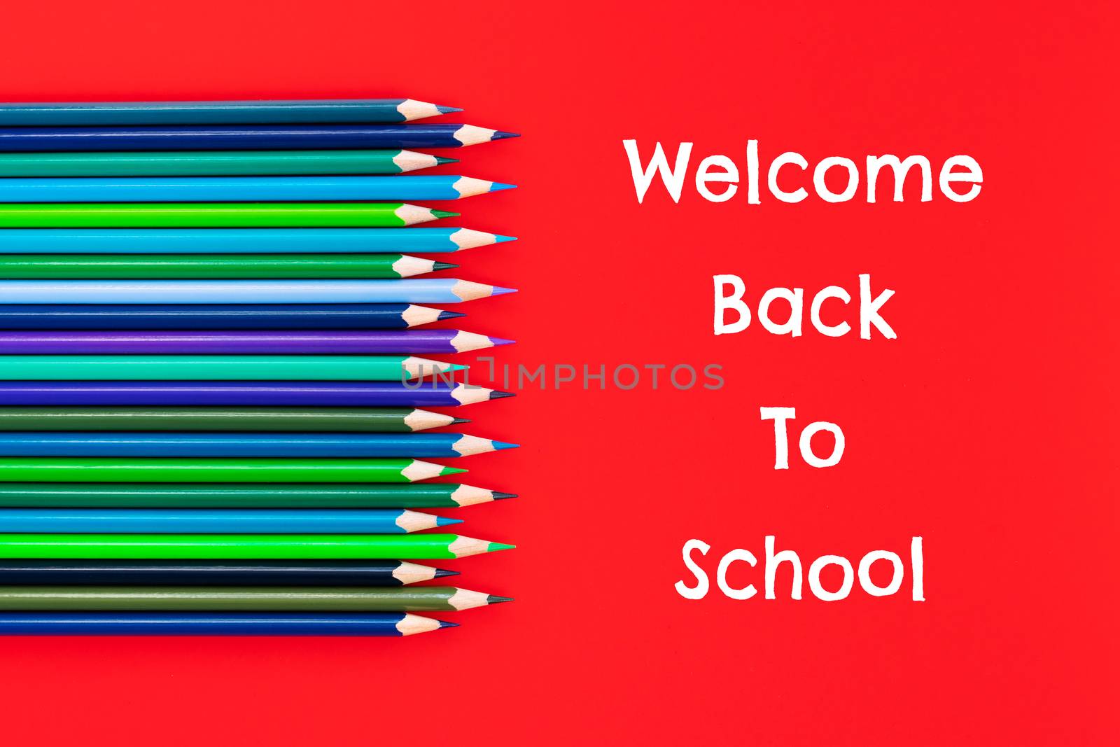 Welcome back to school background, colorful color pencil on red  by psodaz