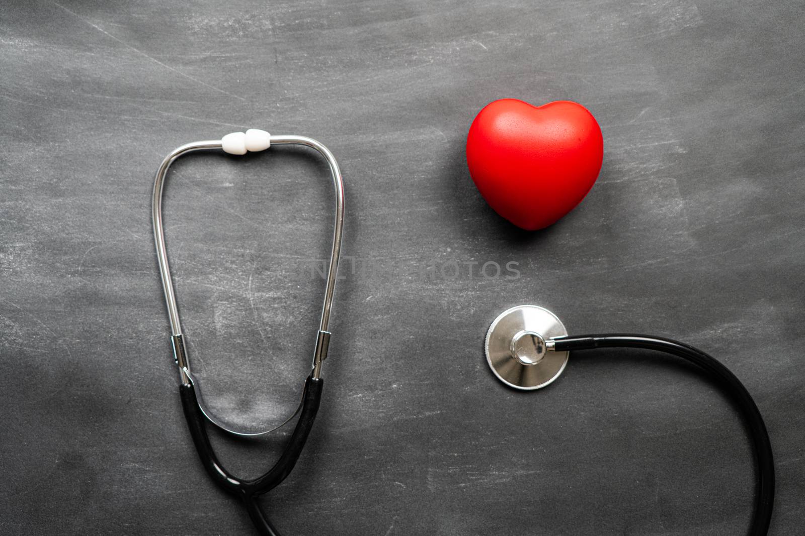 Healthcare medical insurance with red heart and stethoscope