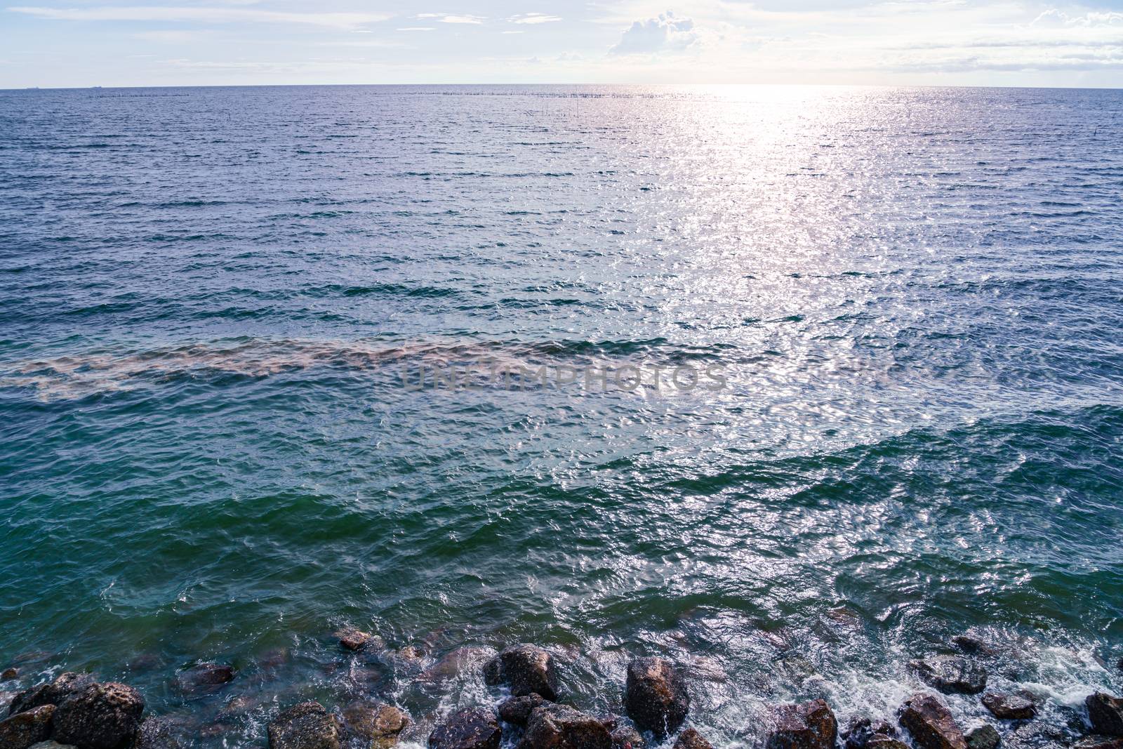 beautiful clouds over meet the blue sea