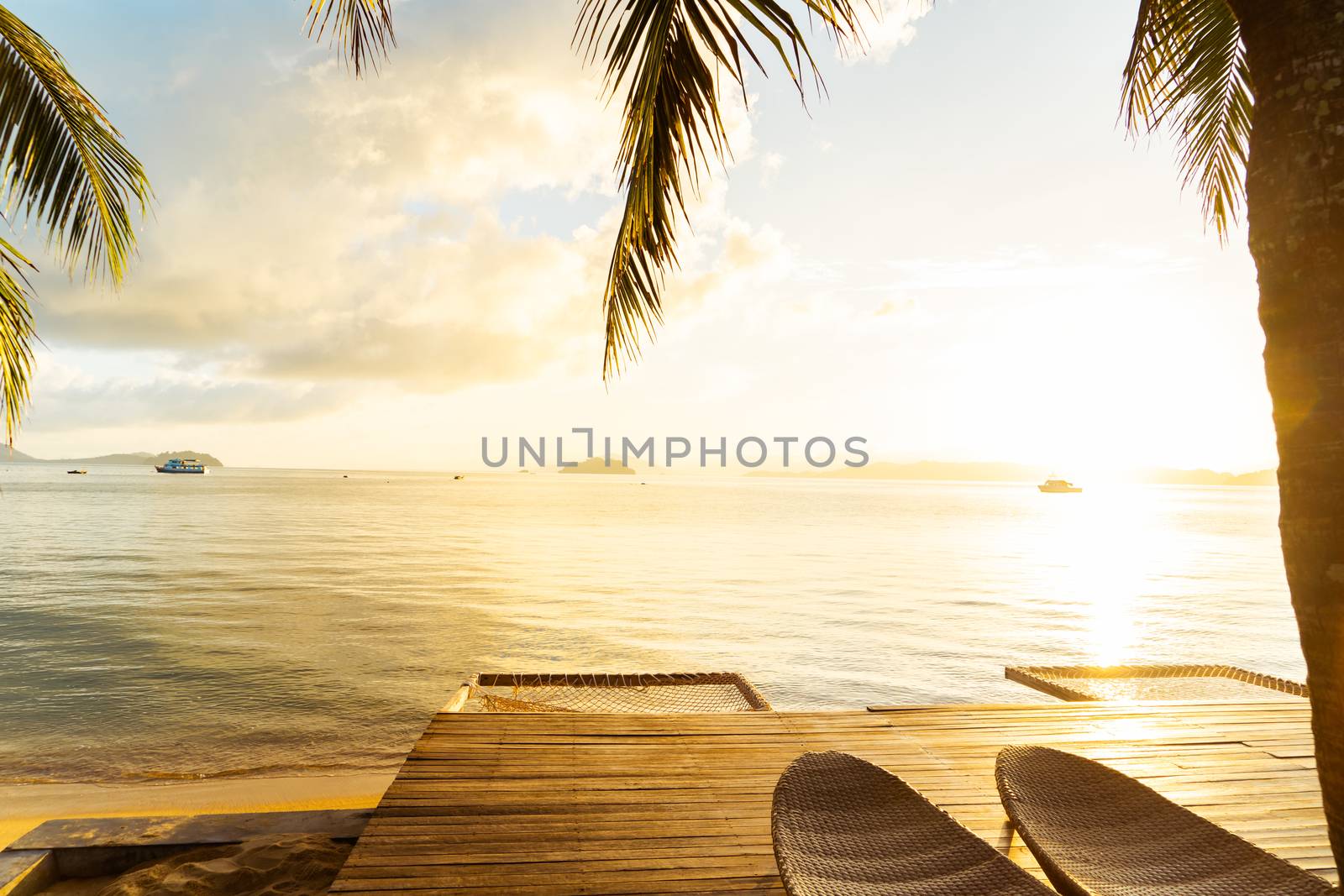 Beautiful beach. Chairs on the  beach font near the sea. Summer holiday and vacation concept