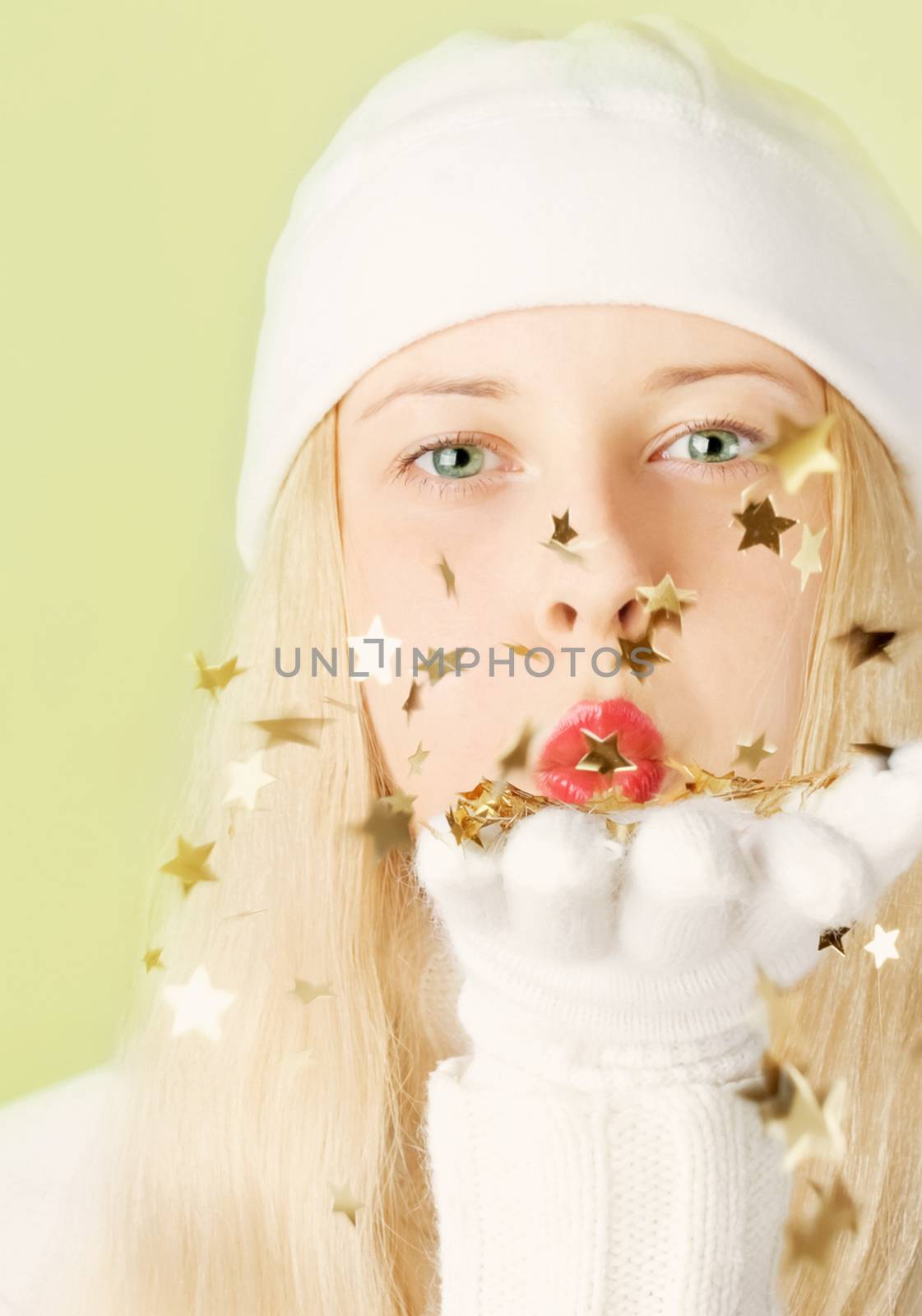 Young woman celebrating Christmas time, happy and cheerful by Anneleven