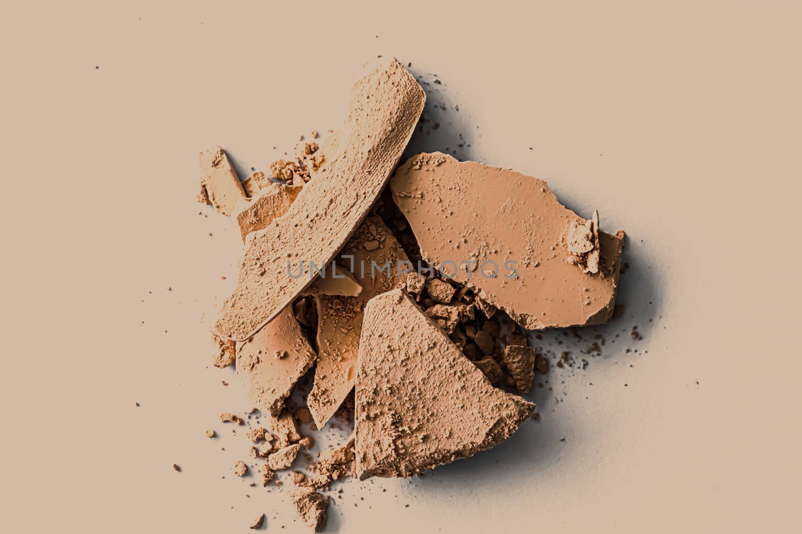 Beige eye shadow powder as makeup palette closeup, crushed cosmetics and beauty textures