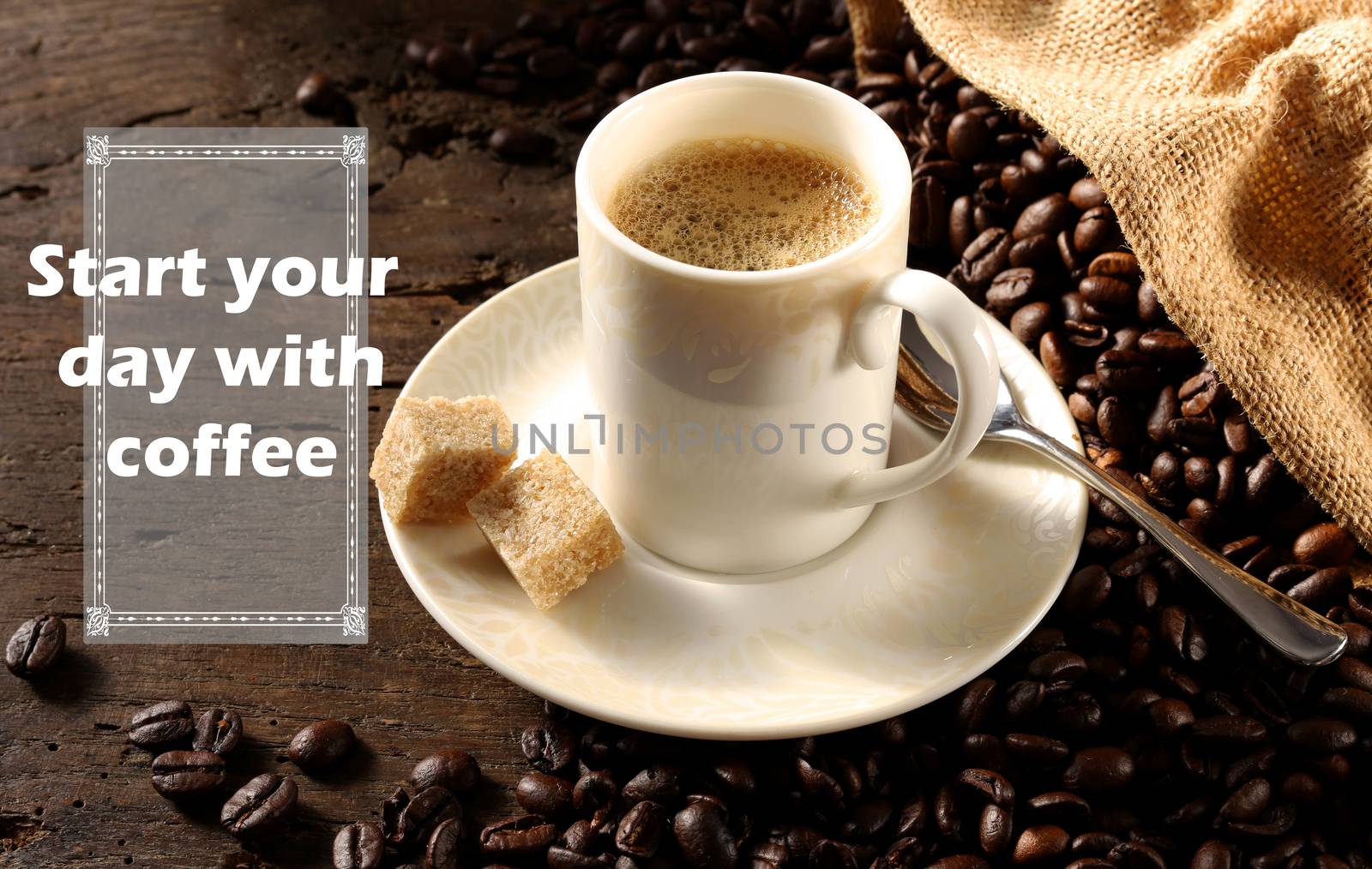 Inspiration life quote Start Your Day with Coffee, cup of coffee on antique wood background with coffee beans. Working from home, home office concept