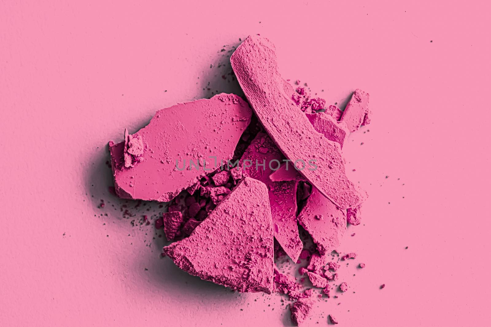 Pink eye shadow powder as makeup palette closeup, crushed cosmetics and beauty texture by Anneleven