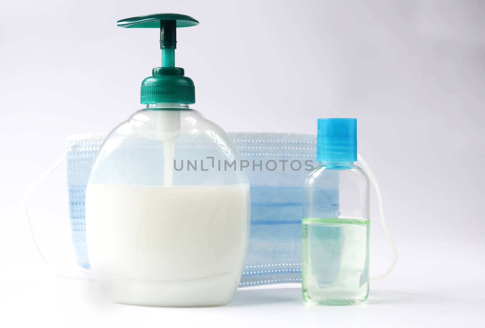Protective face mask, soap, anticeptis, glove against virus on white background