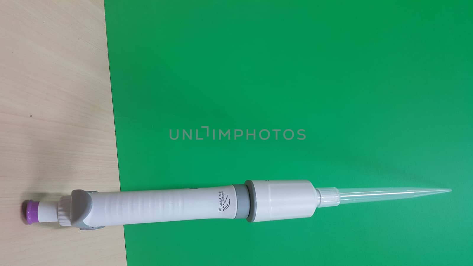 Micro pipettes, micro-chemical equipment placed on a green sheet