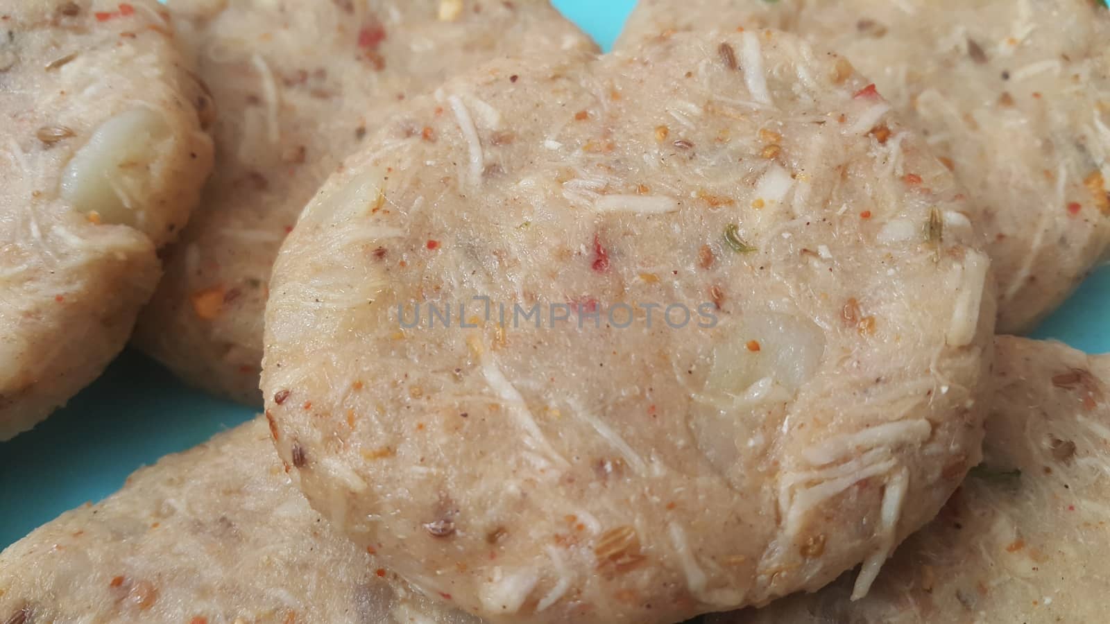 Spicy and tasty uncooked kebab stuffed with minced meat, onion,  alo paste and chana. Asian spicy cuisine.