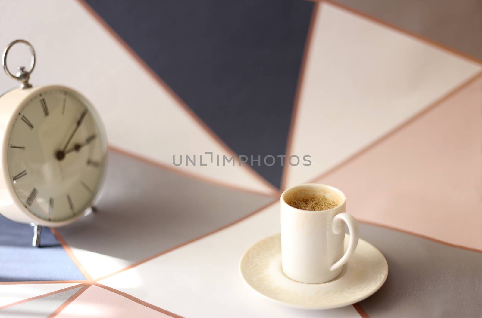 Home office place with stationery, cup of coffee on multicolor background. Home office working station concept