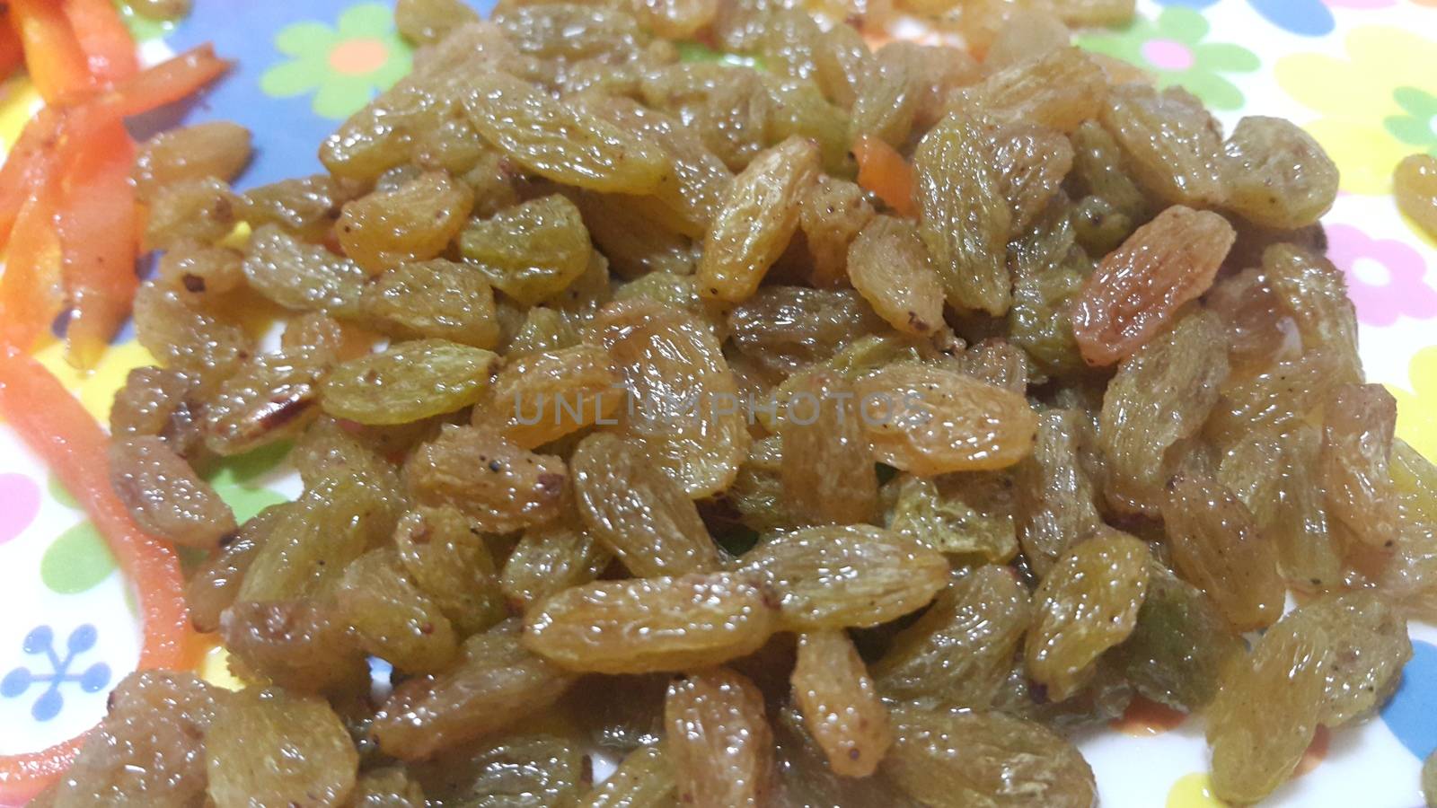 Closeup view of dried or dehydrated fresh green raisins