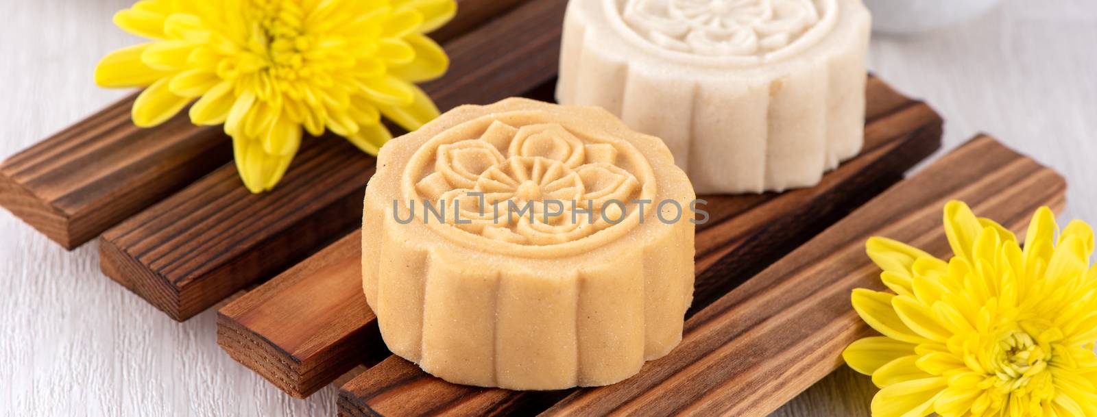 Colorful beautiful moon cake, mung bean cake, Champion Scholar Pastry cake for Mid-Autumn festival traditional gourmet dessert snack, close up.