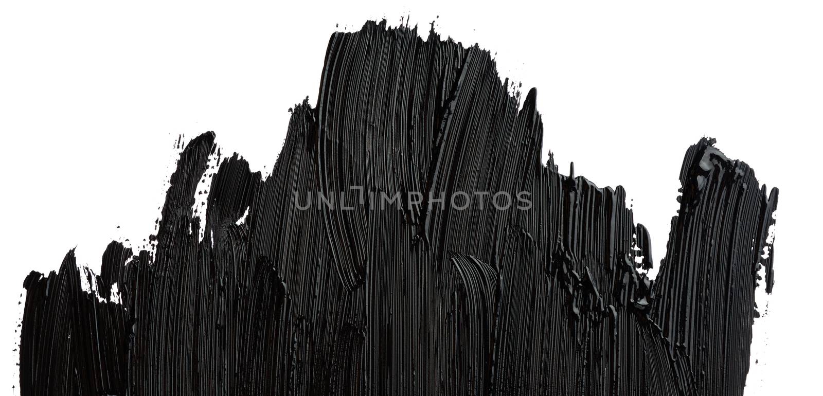 swatch of black smudged acrylic paint isolated on white backgrou by ndanko